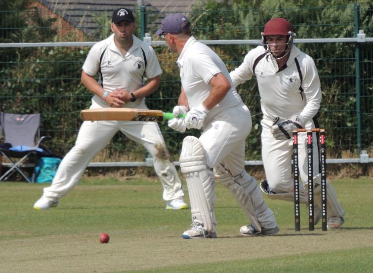 Sean Hannon and Ross Hardy look to stop Alvanley scoring